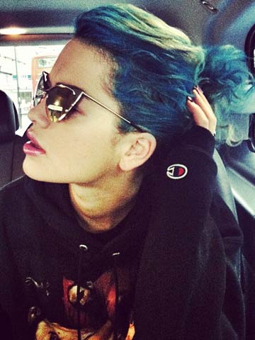 Hey, Smurfette! Cara Delevingne's 'wifey' Rita Ora dyes her hair blue