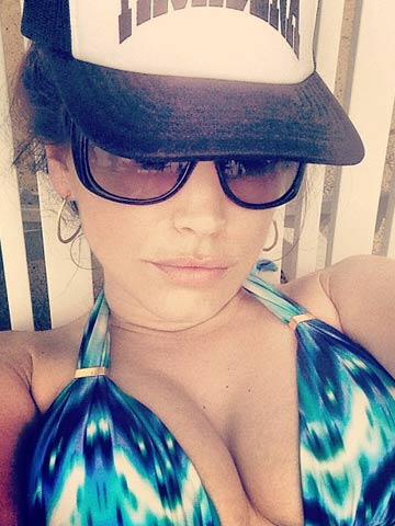 Leave topless Kelly Brook alone! You're all just jealous of her boobs 
