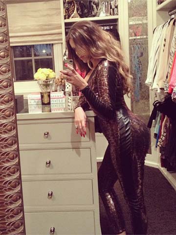 Khloe Kardashian chills at home in big cat sequin onesie after 2st weight loss