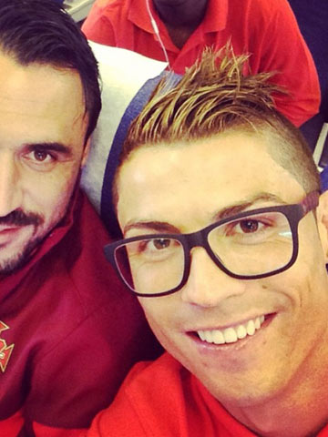 OMG! Cristiano Ronaldo teams new blond hair highlights with pink shorts on holiday in Miami