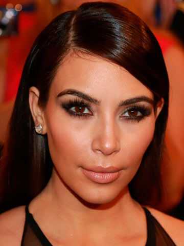 Wow, Kanye West! Kim Kardashian wears fringe in hair and rides a bike for cute Paris-style photoshoot Wow, Kanye West! Kim Kardashian wears fringe in hair and rides a bike for cute Paris-style photoshoot