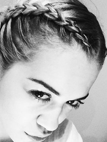 Rita Ora tries out plaits and gets compared to Miley Cyrus in sexy black and white photo Rita Ora tries out plaits and gets compared to Miley Cyrus in sexy black and white photo