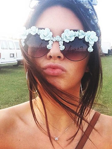 Kendall Jenner swaps giant nose ring for flirty floral sunglasses at Coachella with sister Kylie Kendall Jenner swaps giant nose ring for flirty floral sunglasses at Coachella with sister Kylie