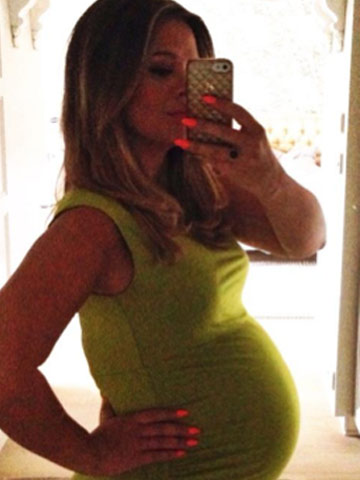 Kimberley Walsh asks if her baby bump looks big in sexy green dress before partying with newly married Cheryl Cole Kimberley Walsh asks if her baby bump looks big in sexy green dress before partying with newly married Cheryl Cole