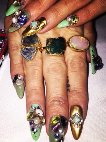 Wowzers! Lily Allen flaunts OTT green nails after telling fans she's 'stepped up her talon game' Wowzers! Lily Allen flaunts OTT green nails after telling fans she's 'stepped up her talon game'