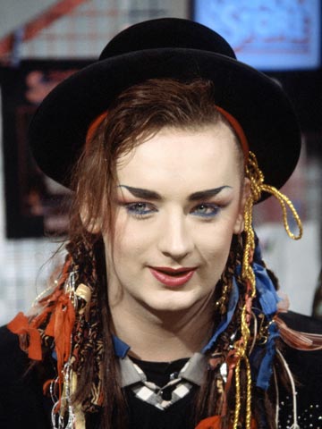 OMG! Boy George shows off thick new curly quiff and crazy red make-up ...